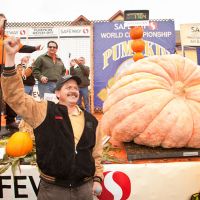 2011 winner Leonardo Urena of Napa, CA with his winning 1,704 lb pumpkin