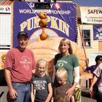 2012 winner Thad Starr and family with his grand champion pumpkin