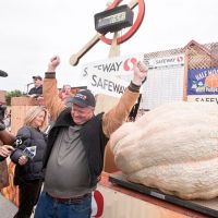 2009 winner Don Young celebrates record-winning 1,658 lb pumpkin
