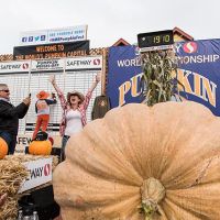2016 Pumpkin Weigh Off Winner Cindy Tobeck celebrates